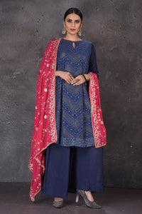 Buy beautiful dark blue palazzo suit online in USA with embroidered pink dupatta. Look elegant at weddings and festive occasions in exclusive designer suits, designer gowns, Anarkali suits, sharara suits, bridal gowns, palazzo suits, designer lehenga from Pure Elegance Indian clothing store in USA.-full view