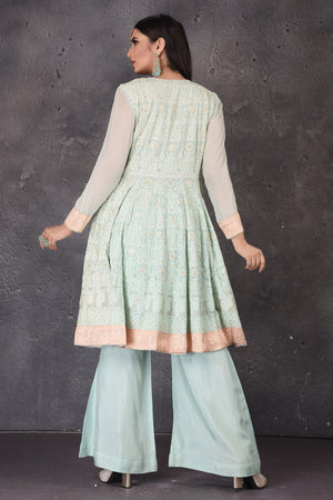 Buy gorgeous mint green embroidered sharara suit online in USA with pink dupatta. Look elegant at weddings and festive occasions in exclusive designer suits, designer gowns, Anarkali suits, sharara suits, bridal gowns, palazzo suits, designer lehenga from Pure Elegance Indian clothing store in USA.-back