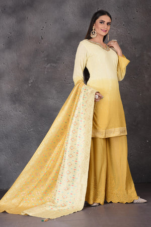 Buy stunning yellow embroidered sharara suit online in USA with dupatta. Look elegant at weddings and festive occasions in exclusive designer suits, designer gowns, Anarkali suits, sharara suits, bridal gowns, palazzo suits, designer lehenga from Pure Elegance Indian clothing store in USA.-dupatta