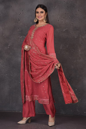 Buy beautiful rouge pink embroidered palazzo suit online in USA with dupatta. Look elegant at weddings and festive occasions in exclusive designer suits, designer gowns, Anarkali suits, sharara suits, bridal gowns, palazzo suits, designer lehenga from Pure Elegance Indian clothing store in USA.-palazzo