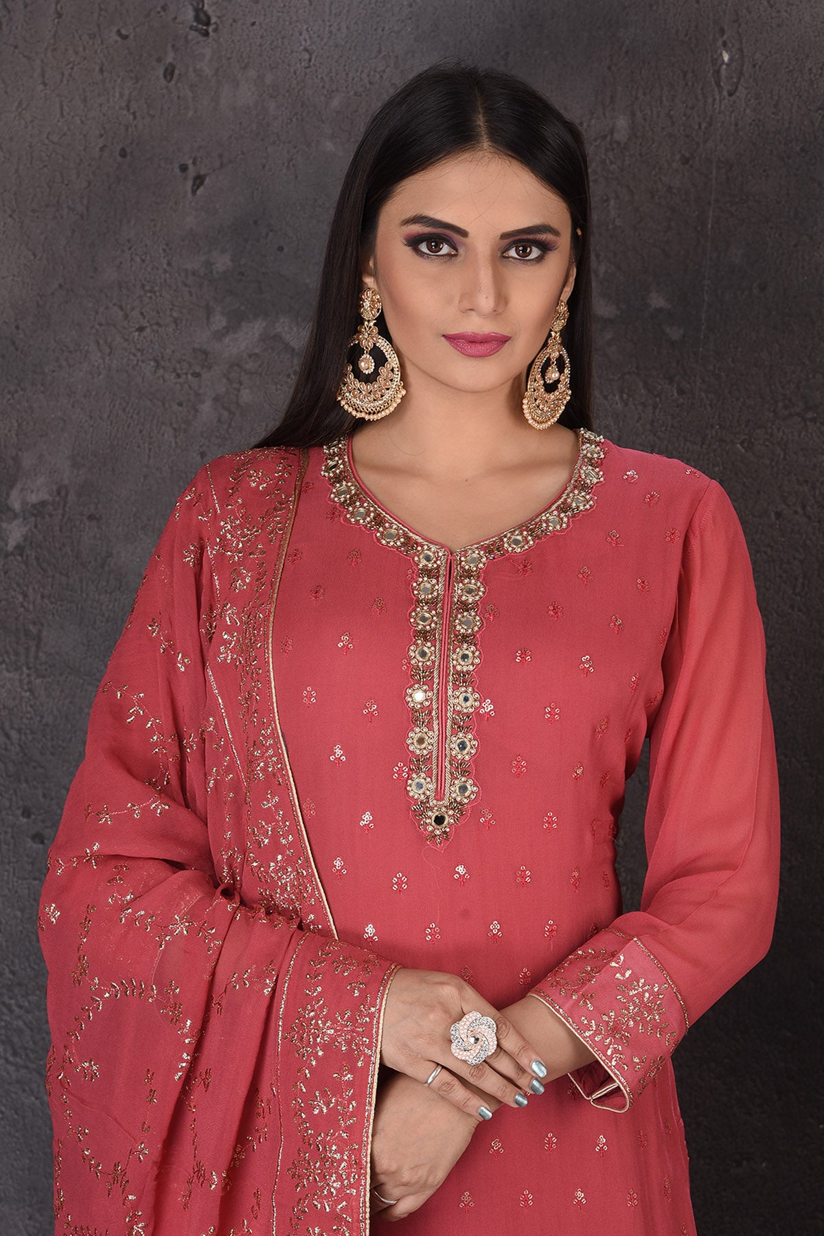 Buy beautiful rouge pink embroidered palazzo suit online in USA with dupatta. Look elegant at weddings and festive occasions in exclusive designer suits, designer gowns, Anarkali suits, sharara suits, bridal gowns, palazzo suits, designer lehenga from Pure Elegance Indian clothing store in USA.-closeup