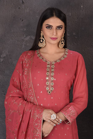Buy beautiful rouge pink embroidered palazzo suit online in USA with dupatta. Look elegant at weddings and festive occasions in exclusive designer suits, designer gowns, Anarkali suits, sharara suits, bridal gowns, palazzo suits, designer lehenga from Pure Elegance Indian clothing store in USA.-closeup