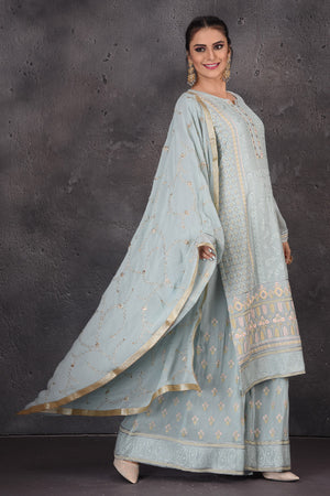 Buy gorgeous powder blue embroidered palazzo suit online in USA with dupatta. Look elegant at weddings and festive occasions in exclusive designer suits, designer gowns, Anarkali suits, sharara suits, bridal gowns, palazzo suits, designer lehenga from Pure Elegance Indian clothing store in USA.-dupatta