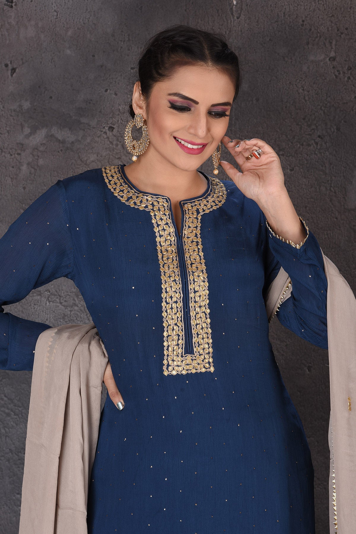 Buy beautiful blue and grey embroidered palazzo suit online in USA with dupatta. Look elegant at weddings and festive occasions in exclusive designer suits, designer gowns, Anarkali suits, sharara suits, bridal gowns, palazzo suits, designer lehenga from Pure Elegance Indian clothing store in USA.-closeup