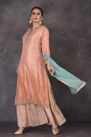 Buy stunning peach embroidered palazzo suit online in USA with blue dupatta. Look elegant at weddings and festive occasions in exclusive designer suits, designer gowns, Anarkali suits, sharara suits, bridal gowns, palazzo suits, designer lehenga from Pure Elegance Indian clothing store in USA.-dupatta