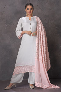 Shop beautiful powder blue embroidered palazzo suit online in USA with pink dupatta. Look elegant at weddings and festive occasions in exclusive designer suits, designer gowns, Anarkali suits, sharara suits, bridal gowns, palazzo suits, designer lehenga from Pure Elegance Indian clothing store in USA.-full view