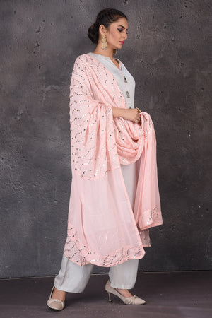 Shop beautiful powder blue embroidered palazzo suit online in USA with pink dupatta. Look elegant at weddings and festive occasions in exclusive designer suits, designer gowns, Anarkali suits, sharara suits, bridal gowns, palazzo suits, designer lehenga from Pure Elegance Indian clothing store in USA.-side