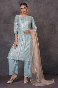 Buy stunning light blue embroidered palazzo suit online in USA with pink dupatta. Look elegant at weddings and festive occasions in exclusive designer suits, designer gowns, Anarkali suits, sharara suits, bridal gowns, palazzo suits, designer lehenga from Pure Elegance Indian clothing store in USA.-full view