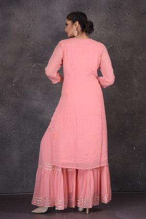 Buy beautiful pink gota embroidery palazzo suit online in USA with dupatta. Look elegant at weddings and festive occasions in exclusive designer suits, designer gowns, Anarkali suits, sharara suits, wedding gowns, palazzo suits, designer lehenga from Pure Elegance Indian clothing store in USA.-back