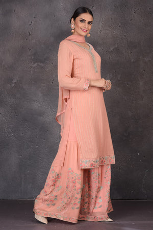 Shop beautiful blush pink embroidered palazzo suit online in USA with dupatta. Look elegant at weddings and festive occasions in exclusive designer suits, designer gowns, Anarkali suits, sharara suits, wedding gowns, palazzo suits, designer lehenga from Pure Elegance Indian clothing store in USA.-side