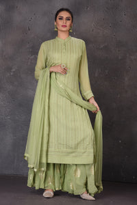 Shop gorgeous pista green and yellow designer lehenga online in USA with dupatta. Look elegant at weddings and festive occasions in exclusive designer suits, designer gowns, Anarkali suits, sharara suits, wedding gowns, palazzo suits, designer lehenga from Pure Elegance Indian clothing store in USA.-full view