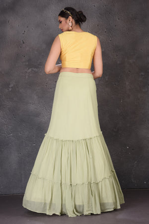 Buy beautiful pista green and yellow designer lehenga online in USA with dupatta. Look elegant at weddings and festive occasions in exclusive designer suits, designer gowns, Anarkali suits, sharara suits, wedding gowns, palazzo suits, designer lehenga from Pure Elegance Indian clothing store in USA.-back