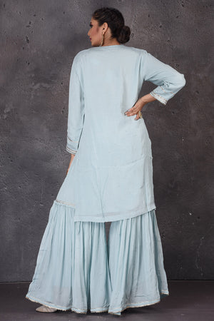 Buy beautiful pastel blue embroidered sharara suit online in USA with pink dupatta. Look elegant at weddings and festive occasions in exclusive designer suits, designer gowns, Anarkali suits, sharara suits, wedding gowns, palazzo suits, designer lehenga from Pure Elegance Indian clothing store in USA.-back
