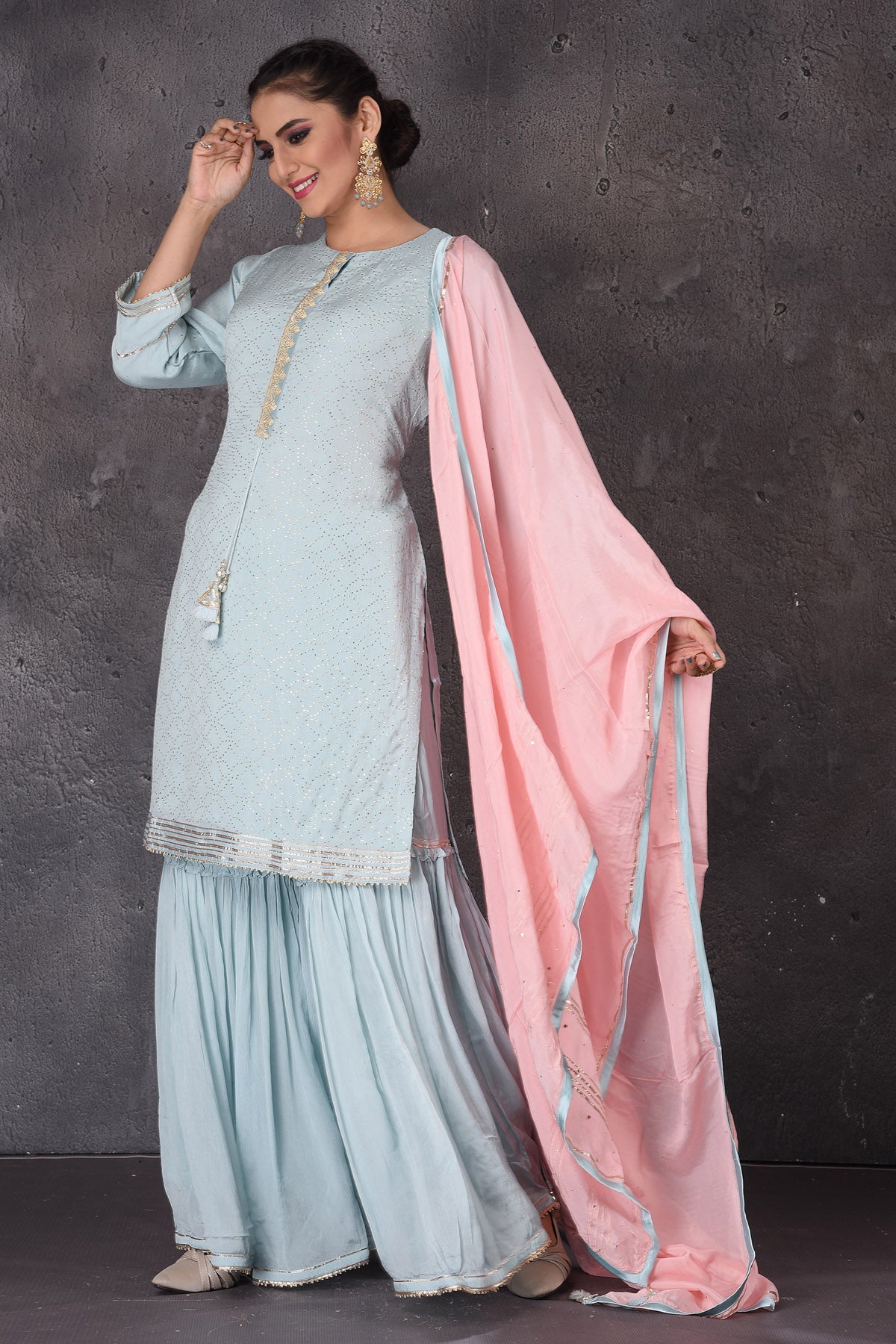 Buy beautiful pastel blue embroidered sharara suit online in USA with pink dupatta. Look elegant at weddings and festive occasions in exclusive designer suits, designer gowns, Anarkali suits, sharara suits, wedding gowns, palazzo suits, designer lehenga from Pure Elegance Indian clothing store in USA.-dupatta