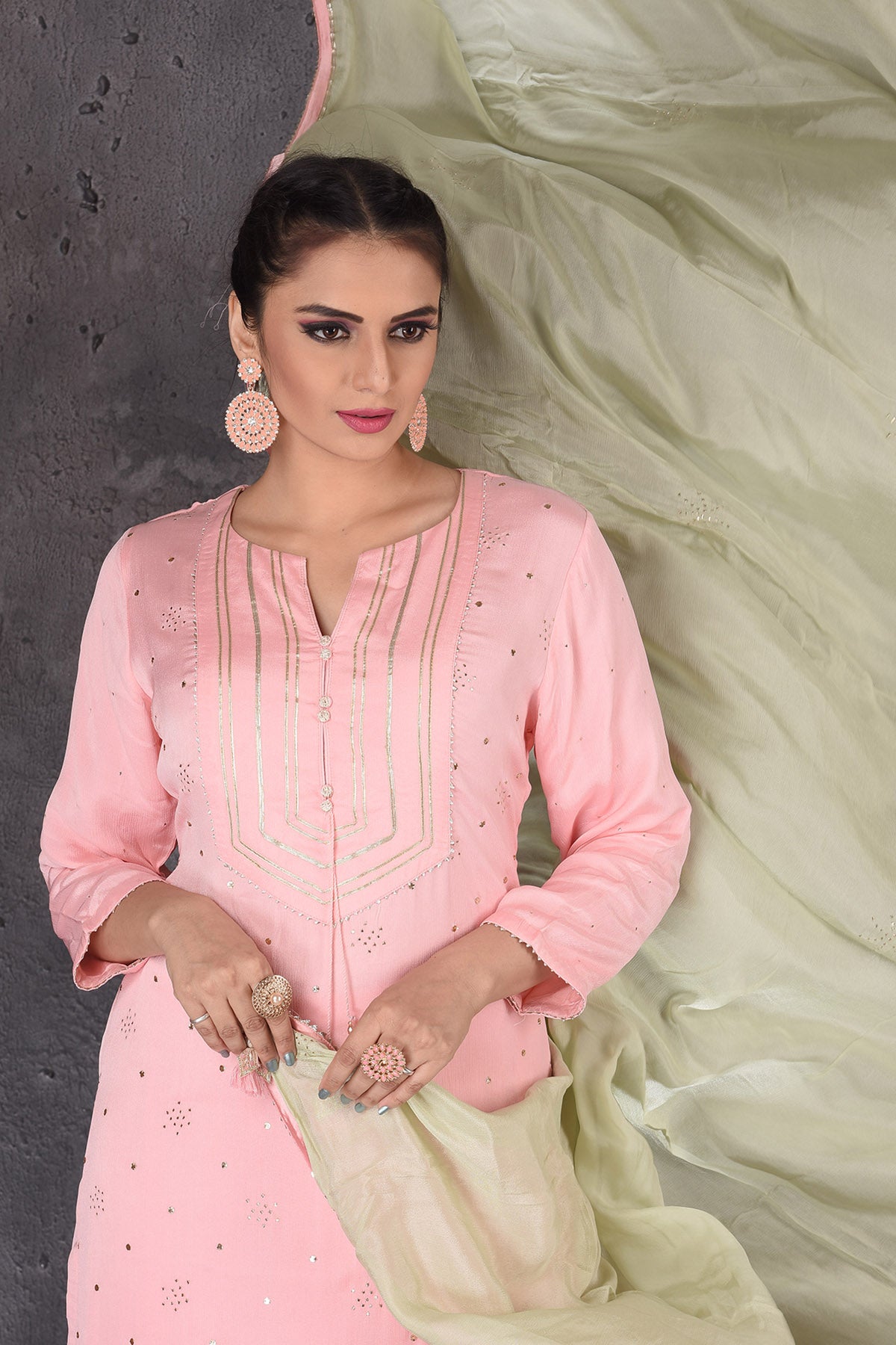Shop stunning pastel pink gota work palazzo suit online in USA with pastel green dupatta. Look elegant at weddings and festive occasions in exclusive designer suits, designer gowns, Anarkali suits, sharara suits, wedding gowns, palazzo suits, designer lehenga from Pure Elegance Indian clothing store in USA.-closeup