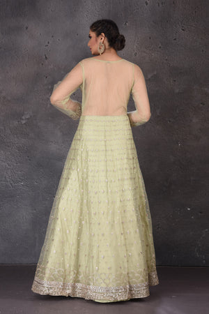 Buy beautiful pista green embroidered Anarkali suit online in USA with dupatta. Look elegant at weddings and festive occasions in exclusive designer suits, designer gowns, Anarkali suits, sharara suits, wedding gowns, palazzo suits, designer lehenga from Pure Elegance Indian clothing store in USA.-back