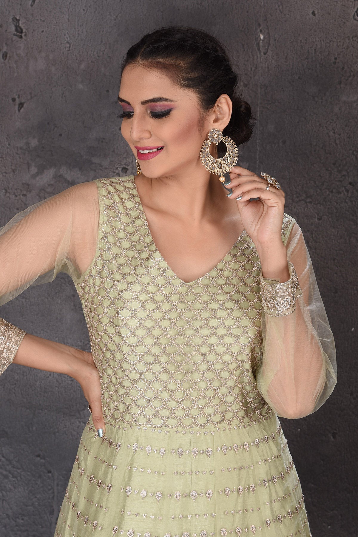 Buy beautiful pista green embroidered Anarkali suit online in USA with dupatta. Look elegant at weddings and festive occasions in exclusive designer suits, designer gowns, Anarkali suits, sharara suits, wedding gowns, palazzo suits, designer lehenga from Pure Elegance Indian clothing store in USA.-closeup