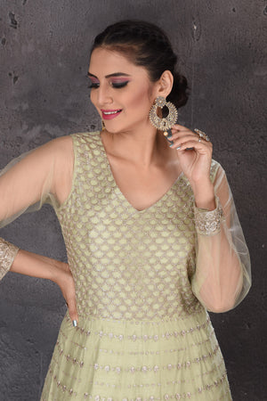 Buy beautiful pista green embroidered Anarkali suit online in USA with dupatta. Look elegant at weddings and festive occasions in exclusive designer suits, designer gowns, Anarkali suits, sharara suits, wedding gowns, palazzo suits, designer lehenga from Pure Elegance Indian clothing store in USA.-closeup