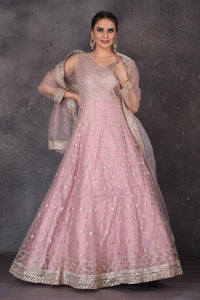 Buy stunning mauve pink embroidered Anarkali suit online in USA with dupatta. Look elegant at weddings and festive occasions in exclusive designer suits, designer gowns, Anarkali suits, sharara suits, wedding gowns, palazzo suits, designer lehenga from Pure Elegance Indian clothing store in USA.-full view