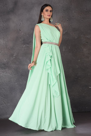 Buy stunning mint green one shoulder designer gown online in USA. Look elegant at weddings and festive occasions in exclusive designer suits, designer gowns, Anarkali suits, sharara suits, wedding gowns, palazzo suits, designer lehenga from Pure Elegance Indian clothing store in USA.-left
