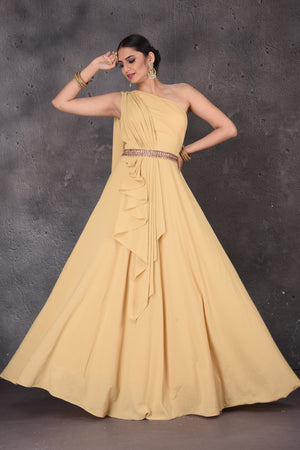 Shop gorgeous yellow one shoulder designer gown online in USA. Look elegant at weddings and festive occasions in exclusive designer suits, designer gowns, Anarkali suits, sharara suits, wedding gowns, palazzo suits, designer lehenga from Pure Elegance Indian clothing store in USA.-front