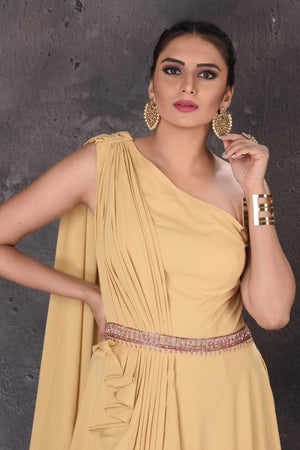 Buy gorgeous mellow yellow one shoulder designer gown online in USA. Look elegant at weddings and festive occasions in exclusive designer suits, designer gowns, Anarkali suits, sharara suits, wedding gowns, palazzo suits, designer lehenga from Pure Elegance Indian clothing store in USA.-closeup