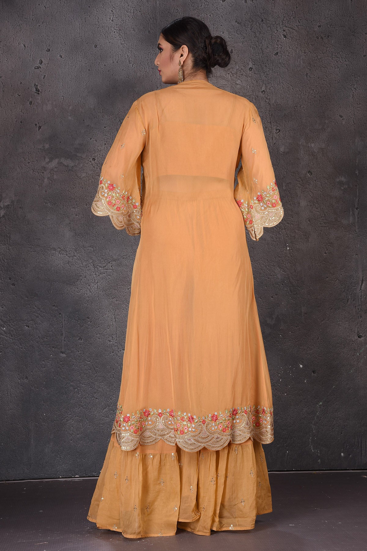Buy stunning yellow embroidered crop top online in USA with palazzo and shrug. Look elegant at weddings and festive occasions in exclusive designer suits, designer gowns, Anarkali suits, sharara suits, wedding gowns, palazzo suits, designer lehenga from Pure Elegance Indian clothing store in USA.-back