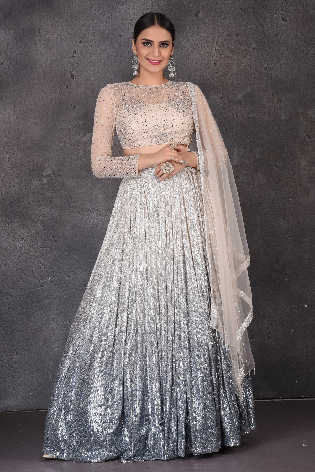 Buy stunning grey and beige sequin work designer lehenga online in USA with dupatta. Look elegant at weddings and festive occasions in exclusive designer suits, designer gowns, Anarkali suits, sharara suits, wedding gowns, palazzo suits, designer lehenga from Pure Elegance Indian clothing store in USA.-full view