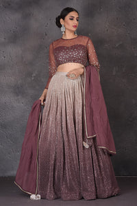 Buy beautiful ombre purple sequin work designer lehenga online in USA with dupatta. Look elegant at weddings and festive occasions in exclusive designer suits, designer gowns, Anarkali suits, sharara suits, wedding gowns, palazzo suits, designer lehenga from Pure Elegance Indian clothing store in USA.-full view