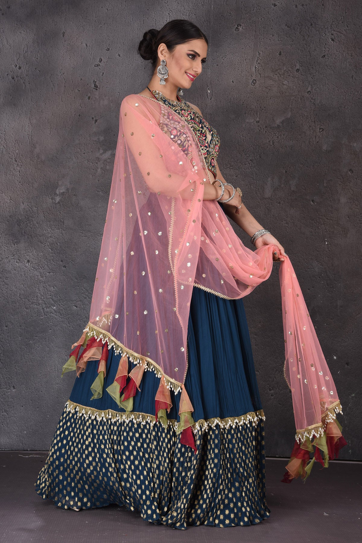 Buy stunning dark blue embroidered lehenga online in USA with pink dupatta. Look elegant at weddings and festive occasions in exclusive designer suits, designer gowns, Anarkali suits, sharara suits, wedding gowns, palazzo suits, designer lehenga from Pure Elegance Indian clothing store in USA.-dupatta