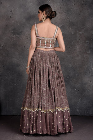 Shop beautiful brown embroidered designer lehenga online in USA with cream dupatta. Set a fashion statement at parties in designer dresses, Anarkali suits, designer lehengas, gowns, Indowestern dresses from Pure Elegance Indian fashion store in USA.-back