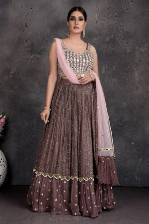 Shop beautiful brown embroidered designer lehenga online in USA with cream dupatta. Set a fashion statement at parties in designer dresses, Anarkali suits, designer lehengas, gowns, Indowestern dresses from Pure Elegance Indian fashion store in USA.-front
