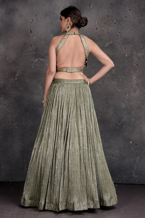 Buy beautiful sage green contemporary lehenga online in USA with dupatta. Set a fashion statement at parties in designer dresses, Anarkali suits, designer lehengas, gowns, Indowestern dresses from Pure Elegance Indian fashion store in USA.-back