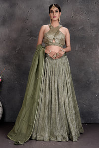 Buy beautiful sage green contemporary lehenga online in USA with dupatta. Set a fashion statement at parties in designer dresses, Anarkali suits, designer lehengas, gowns, Indowestern dresses from Pure Elegance Indian fashion store in USA.-full view