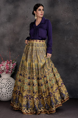 Buy stunning dark blue and yellow printed shirt lehenga online in USA. Set a fashion statement at parties in designer dresses, Anarkali suits, designer lehengas, gowns, Indowestern dresses from Pure Elegance Indian fashion store in USA.-side
