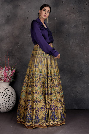 Buy stunning dark blue and yellow printed shirt lehenga online in USA. Set a fashion statement at parties in designer dresses, Anarkali suits, designer lehengas, gowns, Indowestern dresses from Pure Elegance Indian fashion store in USA.-right
