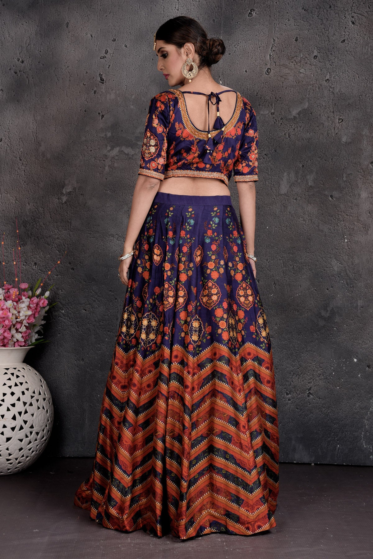 Buy stunning dark blue printed lehenga online in USA with dupatta. Set a fashion statement at parties in designer dresses, Anarkali suits, designer lehengas, gowns, Indowestern dresses from Pure Elegance Indian fashion store in USA.-back
