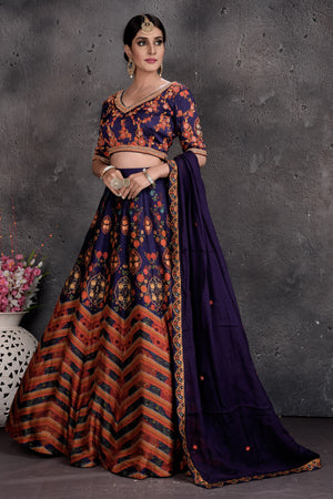 Buy stunning dark blue printed lehenga online in USA with dupatta. Set a fashion statement at parties in designer dresses, Anarkali suits, designer lehengas, gowns, Indowestern dresses from Pure Elegance Indian fashion store in USA.-side