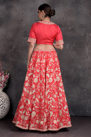 Buy tomato red embroidered designer lehenga online in USA with dupatta. Set a fashion statement at parties in designer dresses, Anarkali suits, designer lehengas, gowns, Indowestern dresses from Pure Elegance Indian fashion store in USA.-back