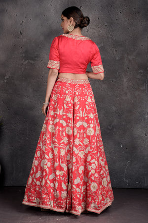 Buy beautiful red embroidered designer lehenga online in USA with dupatta. Set a fashion statement at parties in designer dresses, Anarkali suits, designer lehengas, gowns, Indowestern dresses from Pure Elegance Indian fashion store in USA.-back