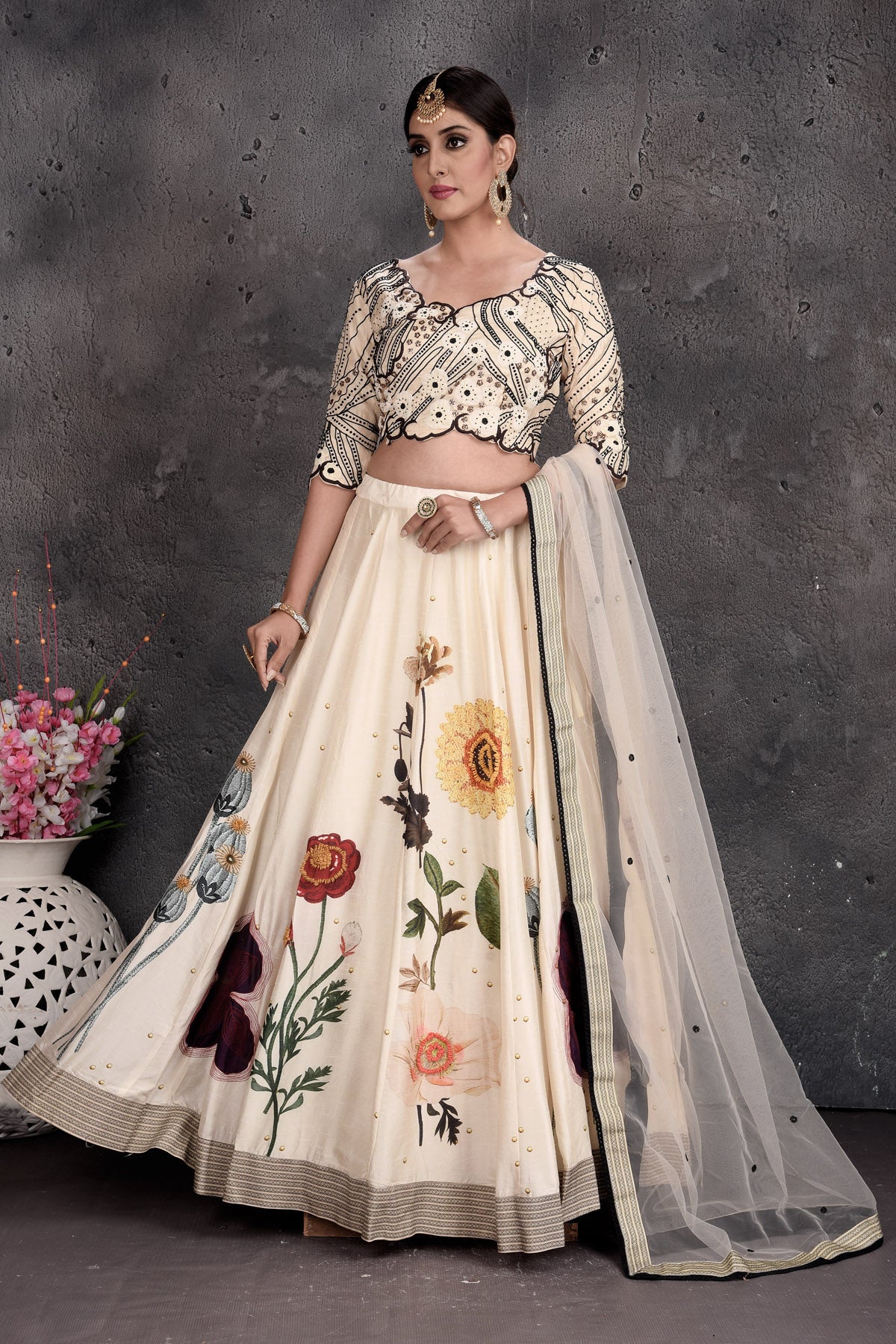 Buy stunning cream embroidered designer lehenga online in USA with dupatta. Set a fashion statement at parties in designer dresses, Anarkali suits, designer lehengas, gowns, Indowestern dresses from Pure Elegance Indian fashion store in USA.-front
