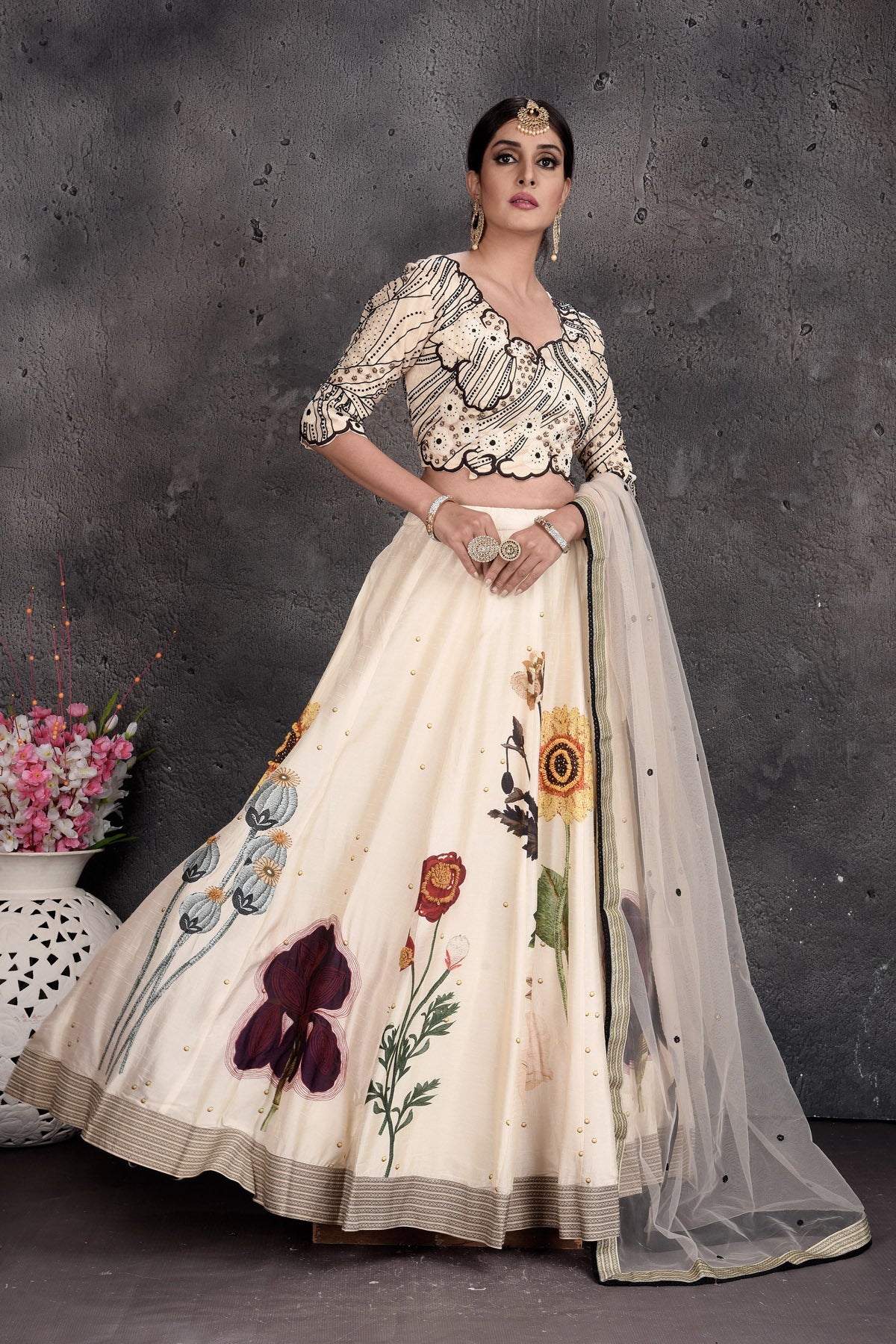 Buy stunning cream embroidered designer lehenga online in USA with dupatta. Set a fashion statement at parties in designer dresses, Anarkali suits, designer lehengas, gowns, Indowestern dresses from Pure Elegance Indian fashion store in USA.-side