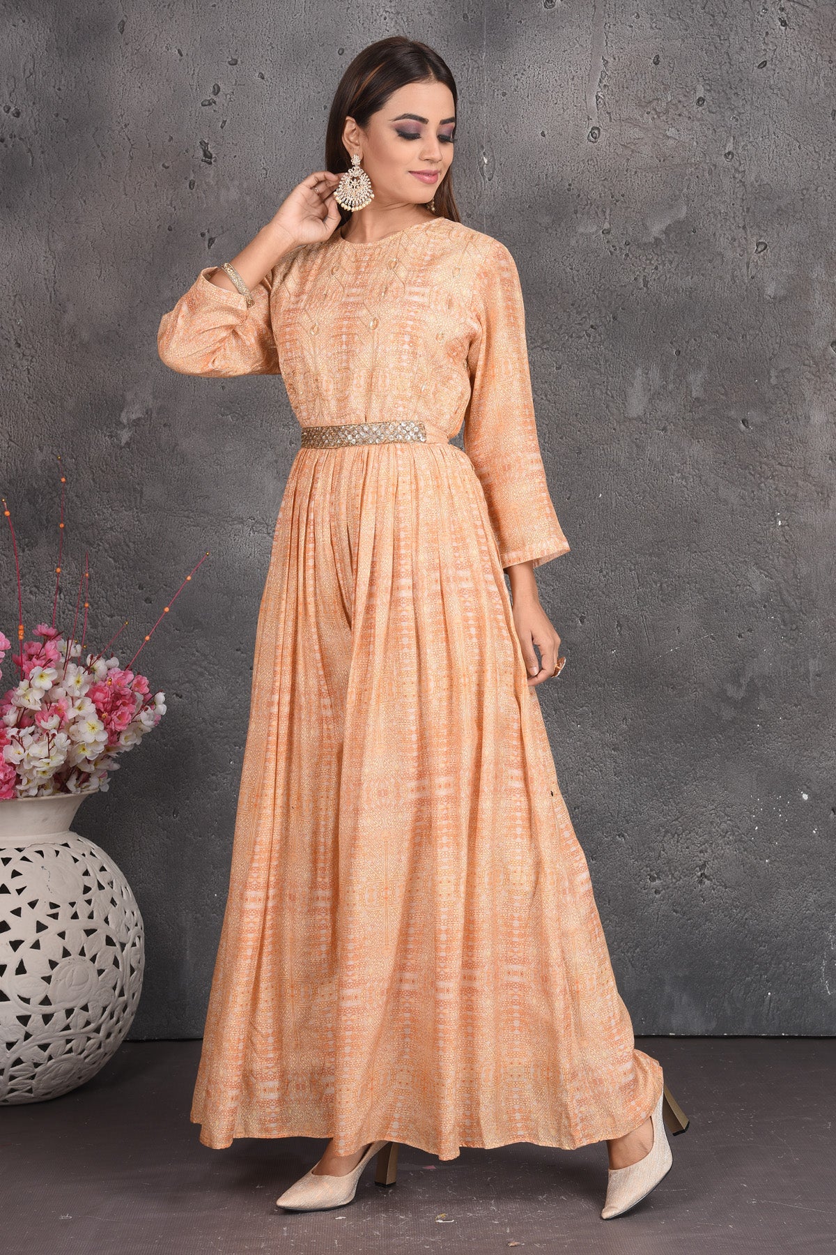 Buy beautiful peach designer jumpsuit online in USA with embellished belt. Set a fashion statement at parties in designer dresses, Anarkali suits, designer lehengas, gowns, Indowestern dresses from Pure Elegance Indian fashion store in USA.-side