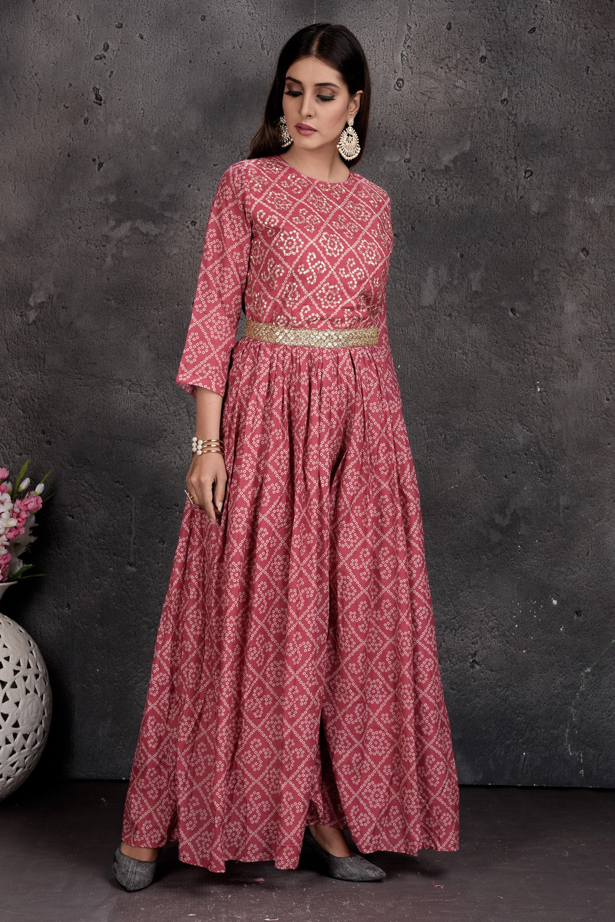 Shop stunning pink bandhej print jumpsuit online in USA. Set a fashion statement at parties in designer dresses, Anarkali suits, designer lehengas, gowns, Indowestern dresses from Pure Elegance Indian fashion store in USA.-side