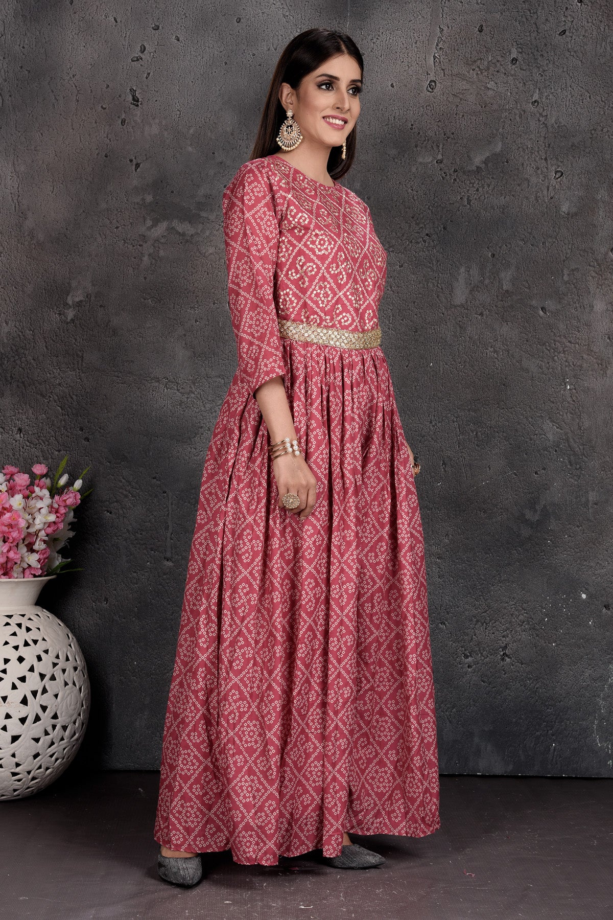 Shop stunning pink bandhej print jumpsuit online in USA. Set a fashion statement at parties in designer dresses, Anarkali suits, designer lehengas, gowns, Indowestern dresses from Pure Elegance Indian fashion store in USA.-right