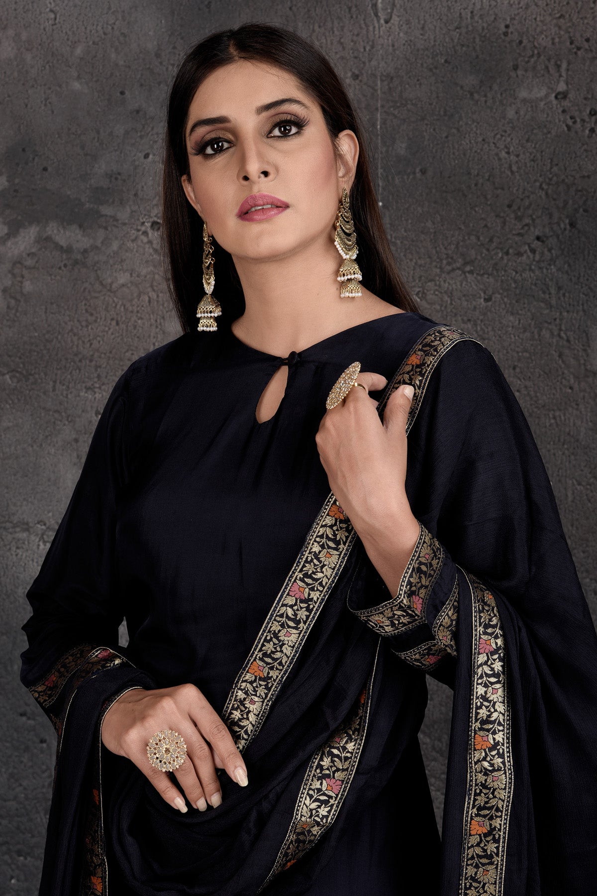 Buy beautiful black palazzo suit online in USA with golden border and dupatta. Set a fashion statement at parties in designer Indian dresses, Anarkali suits, designer lehengas, gowns, Indowestern dresses from Pure Elegance Indian fashion store in USA.-closeup