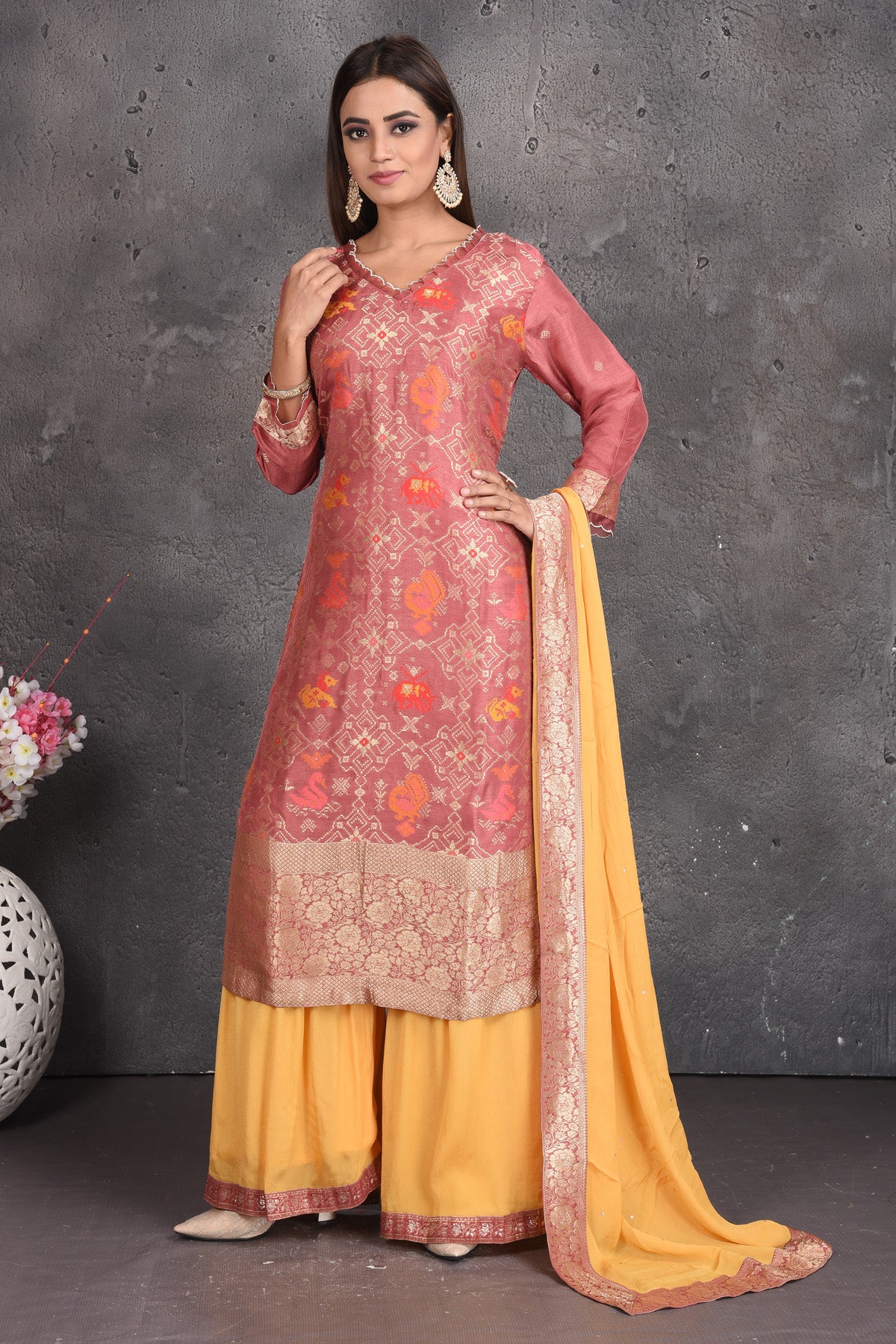 Buy stunning dusty pink and yellow palazzo suit online in USA with dupatta. Set a fashion statement at parties in designer dresses, Anarkali suits, designer lehengas, gowns, Indowestern dresses from Pure Elegance Indian fashion store in USA.-full view