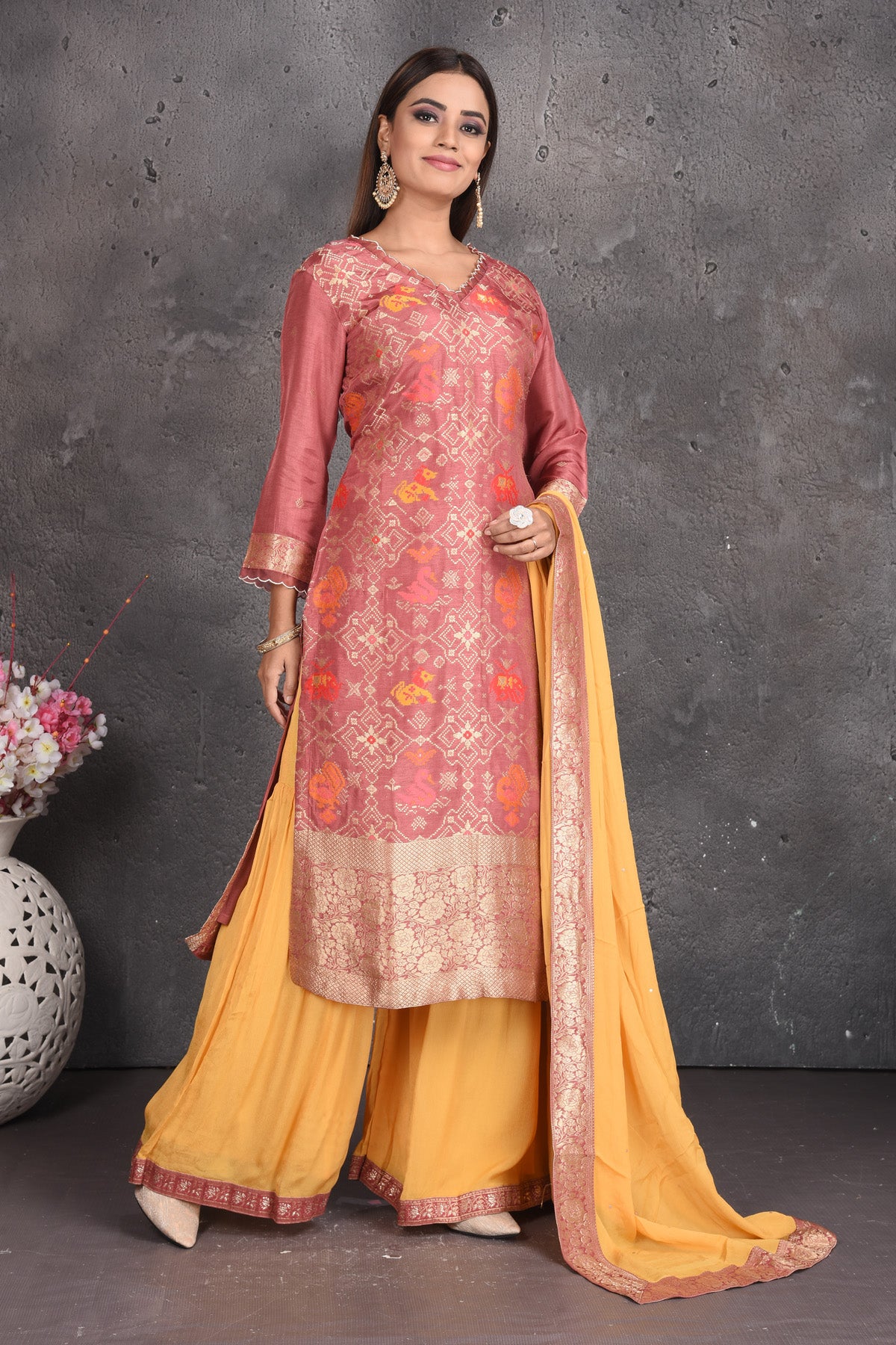 Buy stunning dusty pink and yellow palazzo suit online in USA with dupatta. Set a fashion statement at parties in designer dresses, Anarkali suits, designer lehengas, gowns, Indowestern dresses from Pure Elegance Indian fashion store in USA.-right
