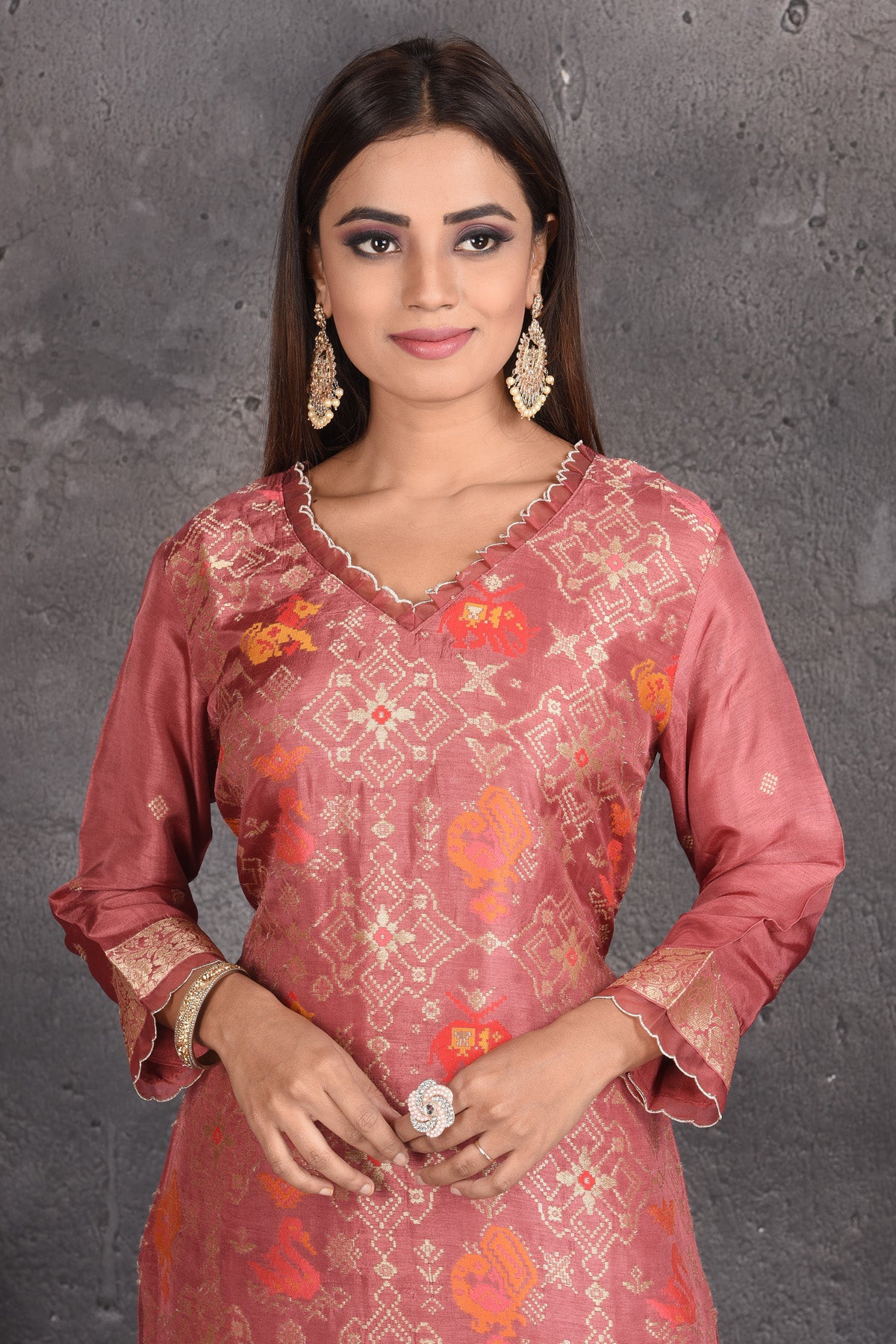 Buy stunning dusty pink and yellow palazzo suit online in USA with dupatta. Set a fashion statement at parties in designer dresses, Anarkali suits, designer lehengas, gowns, Indowestern dresses from Pure Elegance Indian fashion store in USA.-closeup
