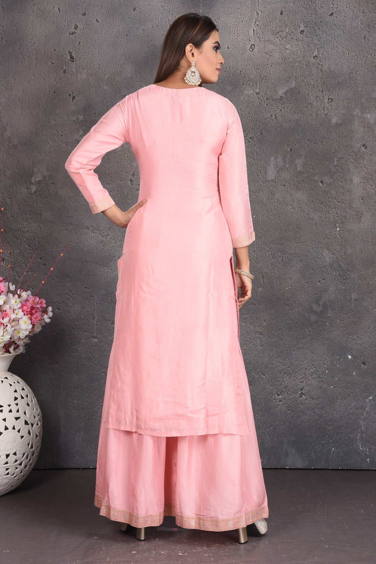 Buy beautiful powder pink embroidered palazzo suit online in USA with dupatta. Set a fashion statement at parties in designer dresses, Anarkali suits, designer lehengas, gowns, Indowestern dresses from Pure Elegance Indian fashion store in USA.-back